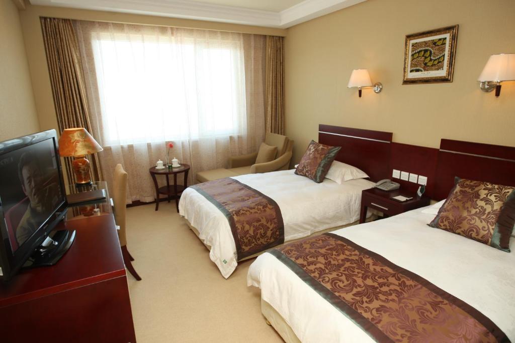 Overseas Chinese International Hotel Čching-tao Exteriér fotografie